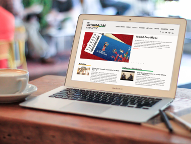 The Ghanaian Reporter Website The Ghanaian Reporter Responsive Web Page on Laptop in Cafe